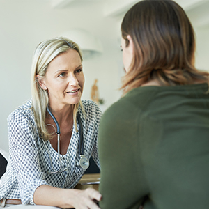 Collaboration Policy Image of Physician in Discussion with Patient